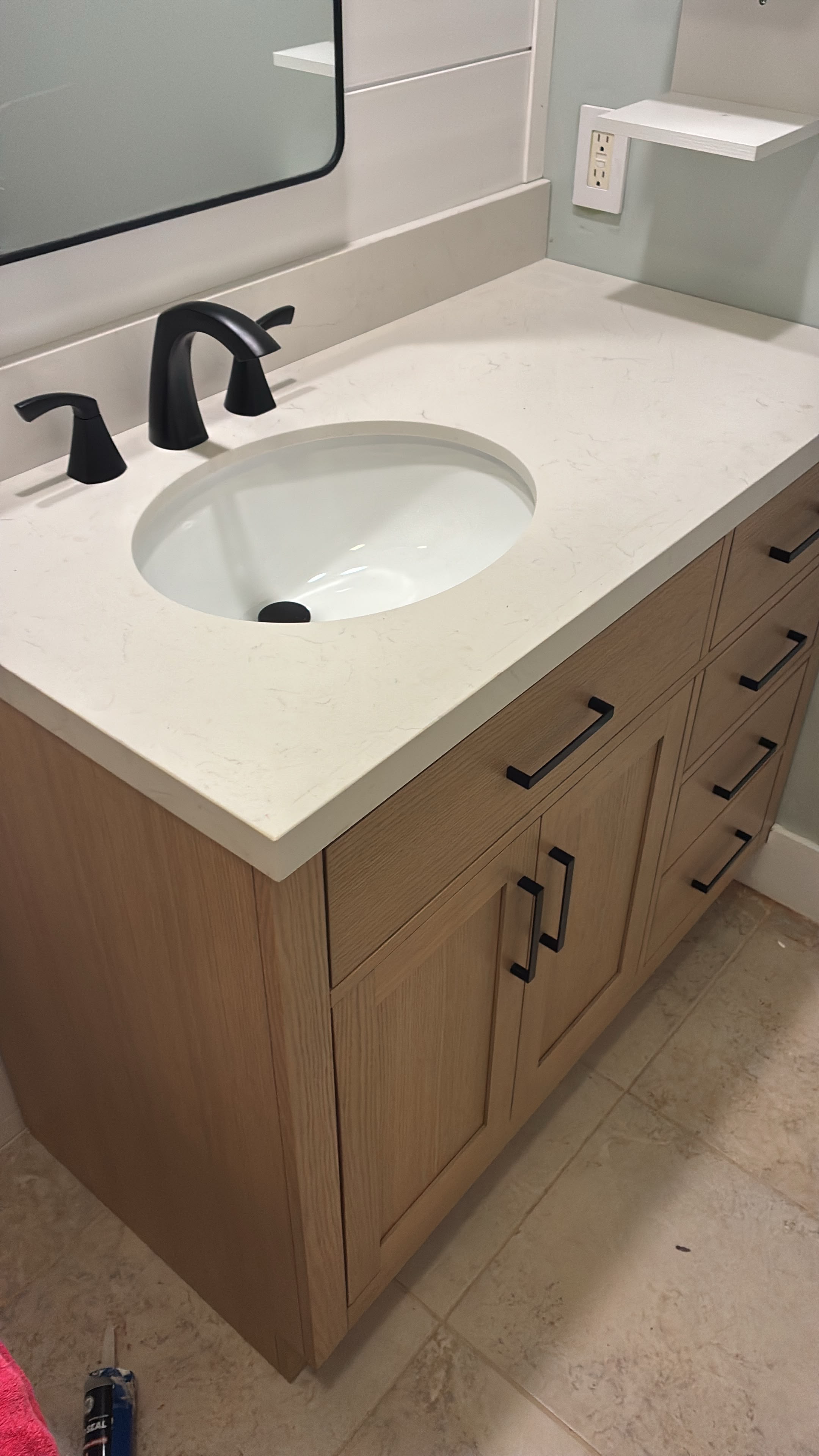 Finished bathroom sink and faucet installation